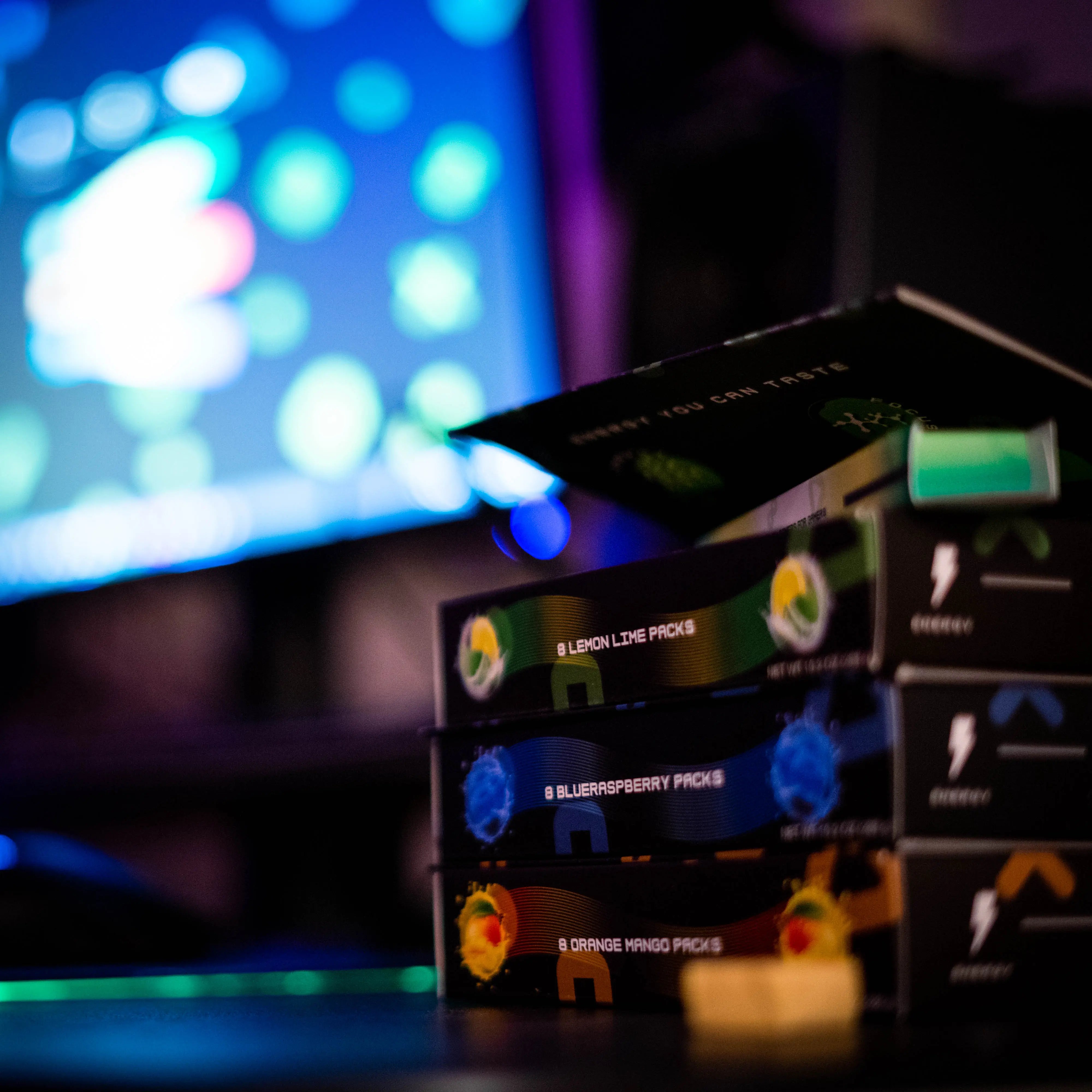 1 Shot Energy Chews - Boxes on Gaming Desk Setup